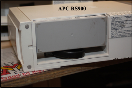APC RS900 battery pack cover removed.