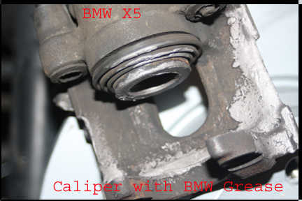 BMW X5 - Rear Caliper with BMW brake grease on it.