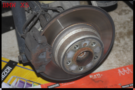 BMW X5 - Rear brake assembly before new installs.