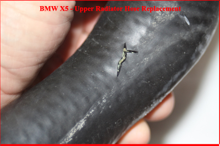 BMW X5 - Shows Crack in Radiator Hose.