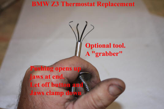 BMW%20Z3%20-%20How%20to%20Replace%20the%20Thermostat%20-%20Showing%20the%20Grabber%20optional%20tool%20open.jpg