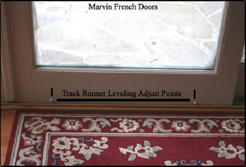 Marvin wood French Doors - Shows where level screws must be used to lower door