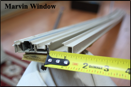 Marvin Wood Double Hung Windows - Shows that Vinyl Track Where Sash Tube Goes is 1inch Wide