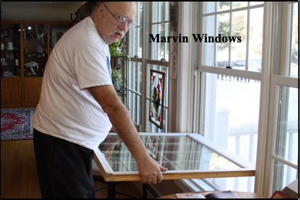 Marvin Wood Double Hung Windows - Shows both sides of window in vinyl track channel and ready to lift front into position