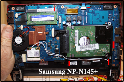 Samsung NP-N145+ - Shows motherboard exposed and screws to be removed to lift out motherboard.