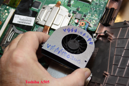 Toshiba A505 - Shows inserting new fan onto motherboard.