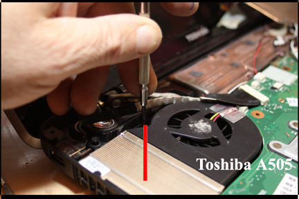 Toshiba A505 - Shows location of hidden cooling fan Phillips screw.