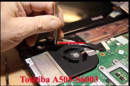 Toshiba A505 - Shows location of hidden cooling fan screw.
