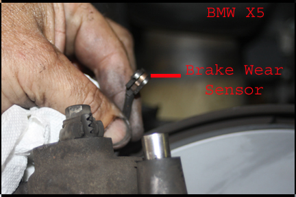 BMW X5 - Rear brake wear sensor.