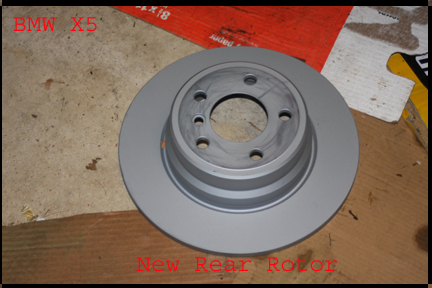 BMW X5 - New rear rotor ready for install.