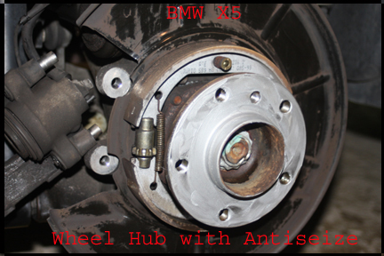 BMW X5 - Shows rear hub with antiseize grease applied, ready for new rotor install.