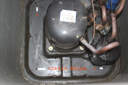 HVAC - Compressor Unit Bottom Cleaned Showing Drain Holes