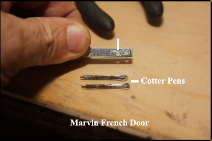 Marvin wood French doors - Shows new actuator pin with new hole drilled in actuator and cotter pins to be used