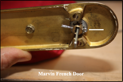 Marvin wood French doors - Shows cotter pins inserted through locking knob and new actuator