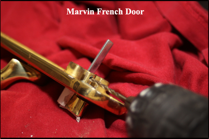 Marvin wood French doors - Shows drilling a new hole in new actuator pin