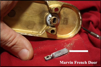 Marvin wood French doors - Shows actuator removed from locking knob