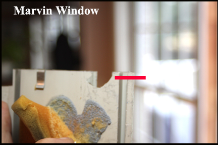 Marvin Wood Double Hung Windows - Shows Where Sash Tube Clip Broke Out Vinyl Track at Top