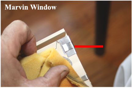 Marvin Wood Double Hung Windows - Shows Sash Tube Clip Properly Fitted over Top of Vinyl Track